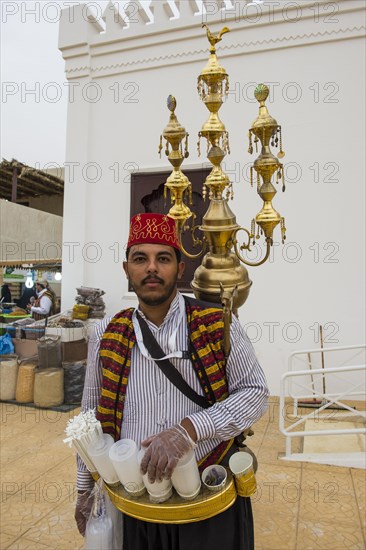 Colourful dressed traditional tea sekker