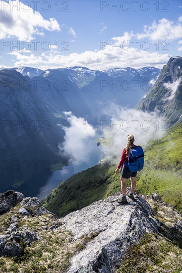 Hiker looking down into the valley
