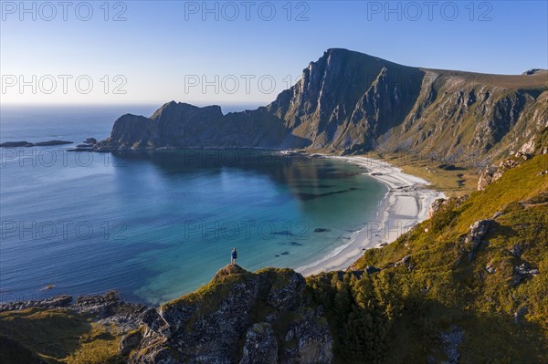 Hiker standing at the precipice