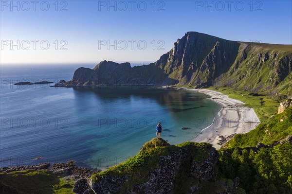 Hiker standing at the precipice