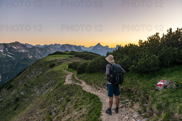 Hiker on hiking trail at Baerenkopf