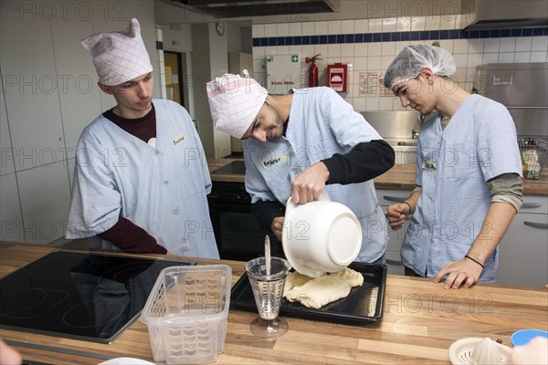 Baking in practical lessons in home economics