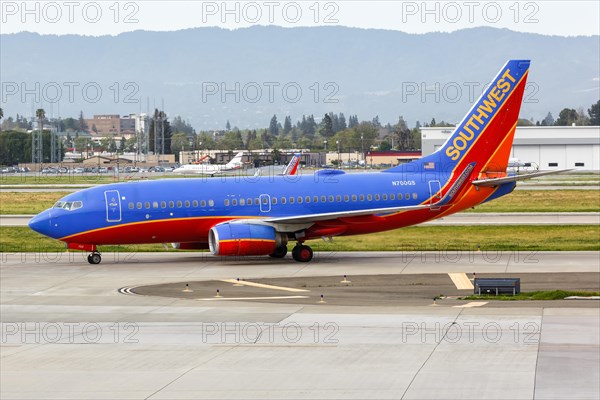 A Southwest Airlines Boeing 737-700 aircraft with registration N700GS at San Jose Airport