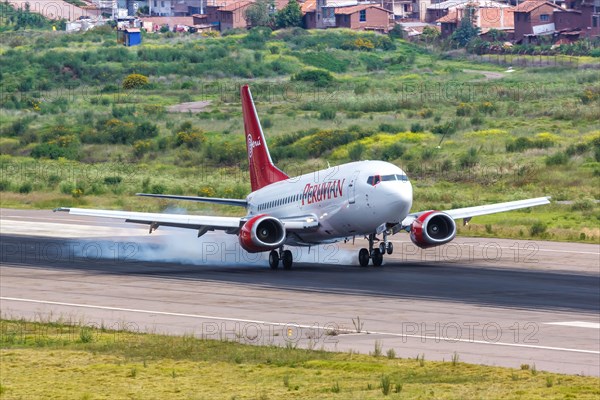 A Peruvian Boeing 737-500 aircraft with registration number OB2138P lands at Cuzco airport