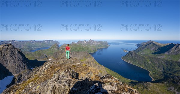 Hiker standing on top of Grytetippen