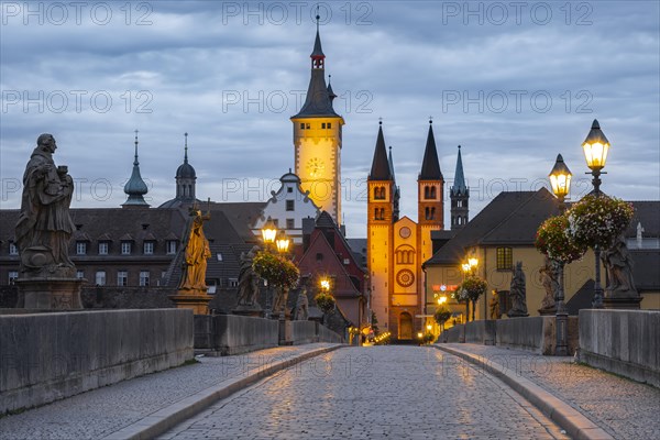 Old bridge over the river Main at dawn