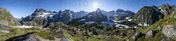 Sun shining on mountain panorama