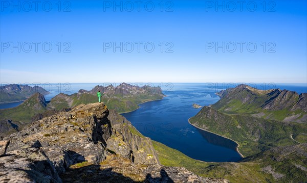 Hiker standing on top of Grytetippen