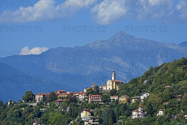 The town Pino sulla Sponda del Lago Maggiore and peak Pizzo di Vogorno