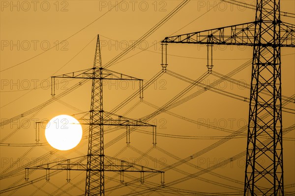Power pylons at sunset