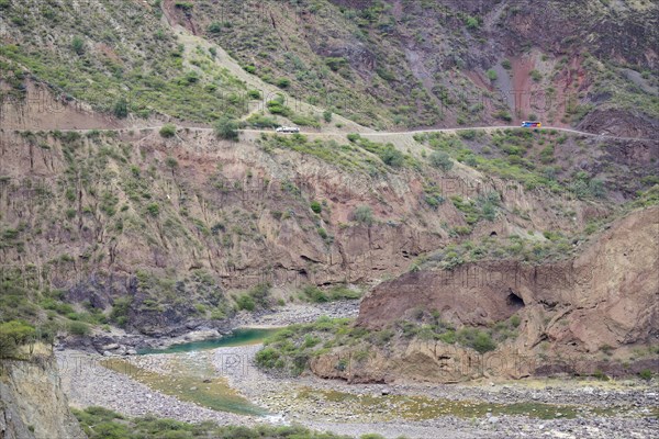 Coach and truck above the gorge of the Rio Mantaro
