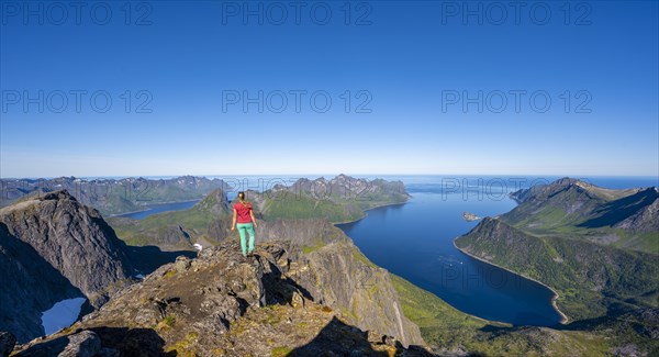 Hiker standing on top of Grytetippen
