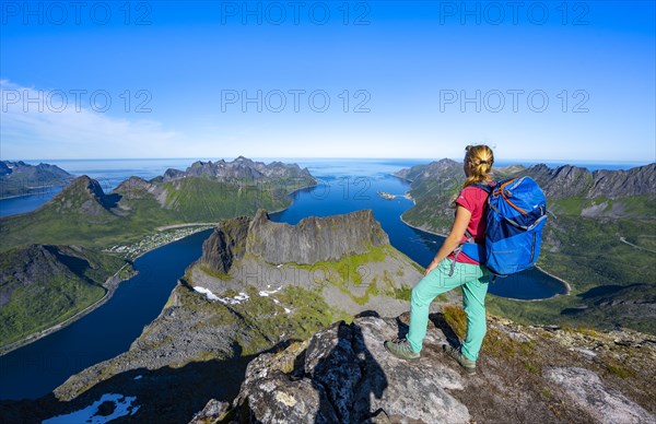 Hiker standing on top of Grytetippen