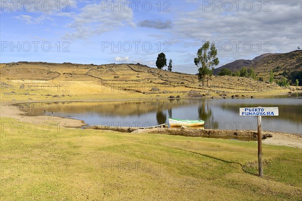 Rowing boat on the shore of Laguna Pumaqucha