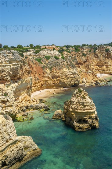 View of cliff of craggy sandstone rocks