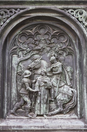 Scenes from the life of Martin Luther on the pedestal of the Luther Monument in Moehra
