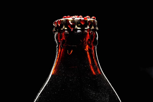 Bottle with crown cork with water drops