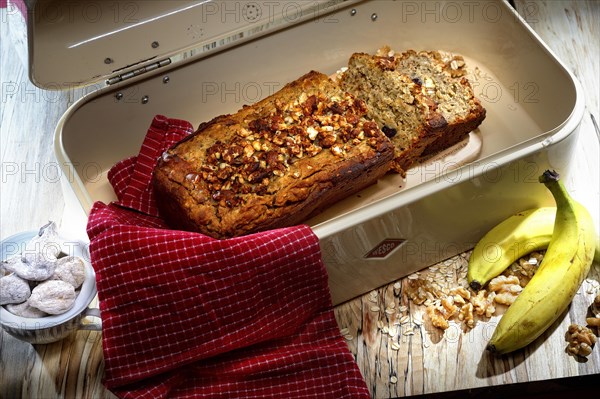 Baked fresh banana bread in bread box