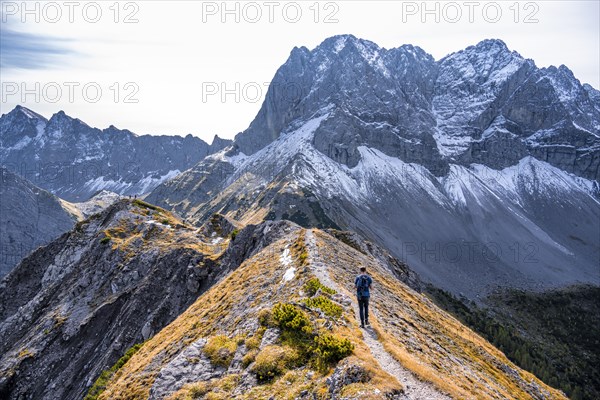Hiker on degree in the mountains