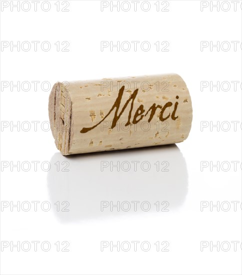 Merci branded wine cork isolated on a white background