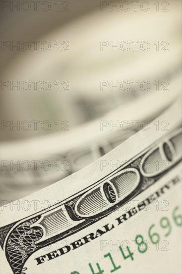 An abstract of one hundred dollar bills with narrow depth of field