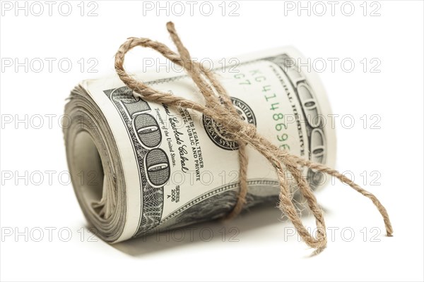 Roll of one hundred dollar bills tied in burlap string isolated on a white background