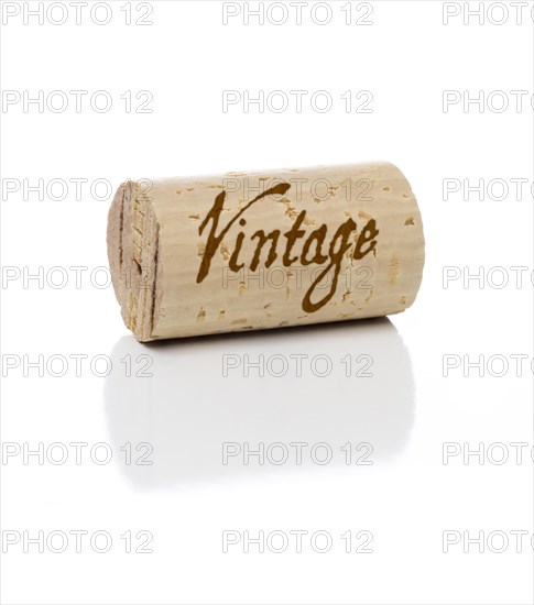 Vintage branded wine cork isolated on a white background