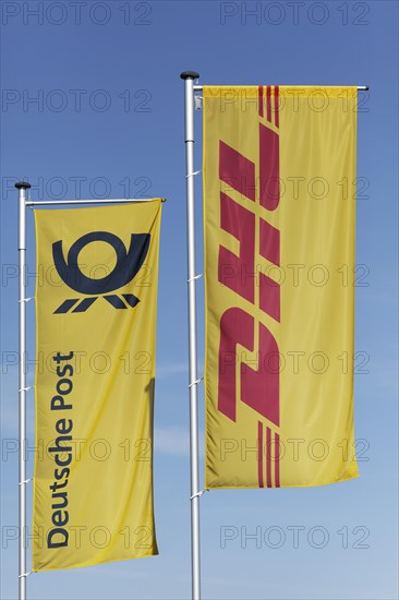 Flags with logos DHL and Deutsche Post