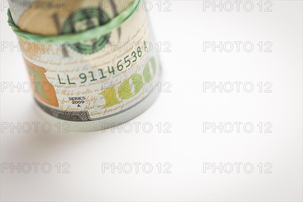 Abstract roll of newly designed U.S. one hundred dollar bills