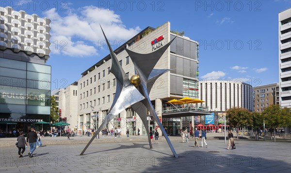 Pedestrian zone Prager Strasse with sculpture Voelkerfreundschaft and round cinema