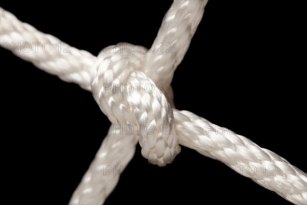 Nylon rope knot on a black background