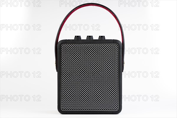 Black modern bluetooth loudspeaker isolated on white background