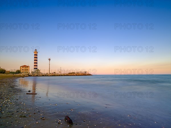 Lighthouse Faro and Adriatic Sea in the evening light