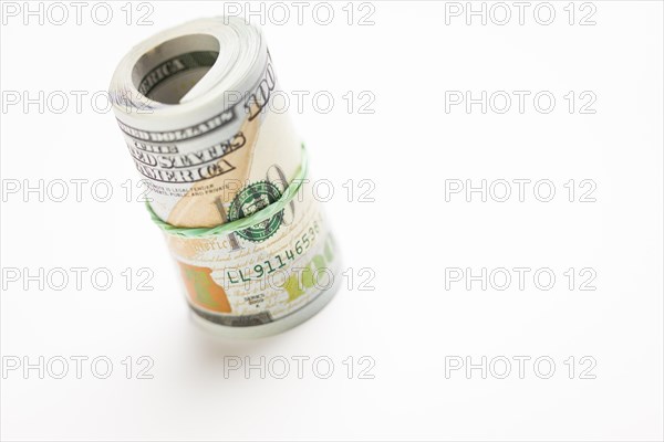 Abstract roll of newly designed U.S. one hundred dollar bills