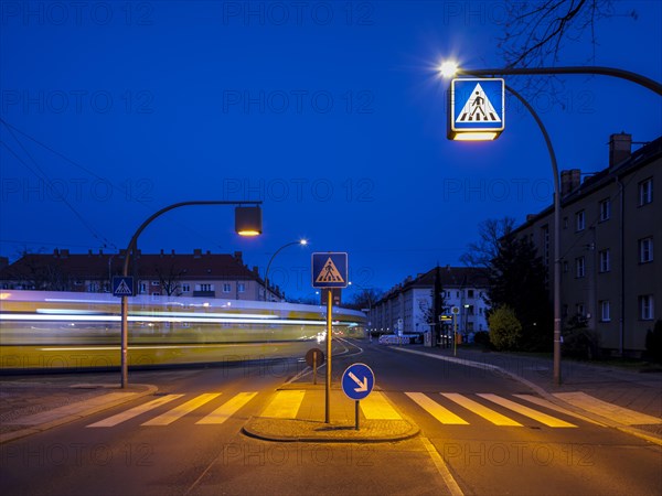 Traffic center island with zebra crossing Rennbahnstrasse Pasedagplatz