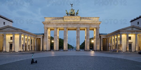 Illuminated Brandenburg Gate in the morning