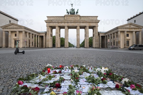 Brandenburg Gate with silent protest on Pariser Platz in the early morning