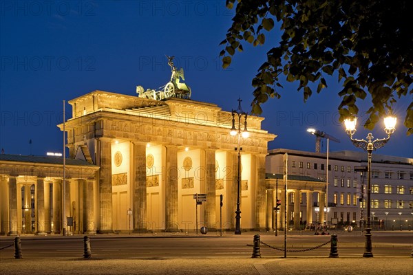 Illuminated Brandenburg Gate in the evening