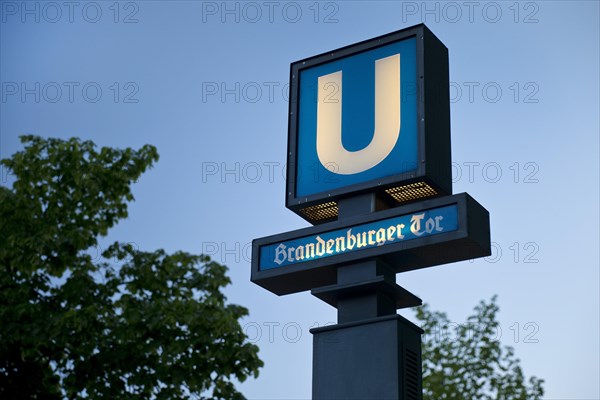 Sign underground station Brandenburg Gate in the evening