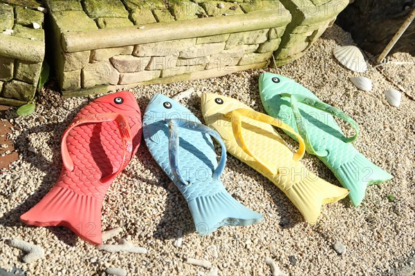 Colourful fish-shaped sandals as souvenirs