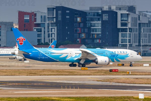 A China Southern Airlines Boeing 787-9 Dreamliner with registration number B-20CJ at Shanghai Hongqiao Airport