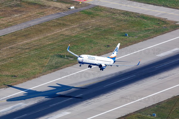 A SunExpress Boeing 737-800 with the registration D-ASXA takes off from Stuttgart Airport