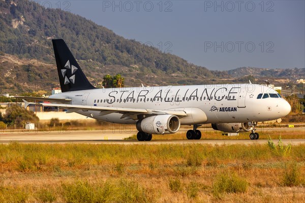 An Airbus A320 aircraft of Aegean Airlines with registration SX-DVQ and European Starling Alliance special livery at Rhodes Airport