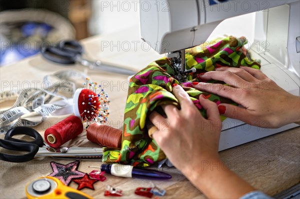 Dressmaker at the sewing machine