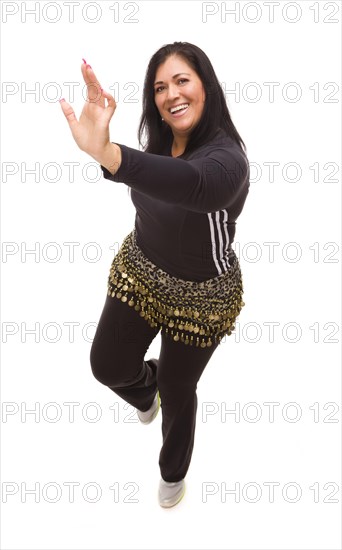 Attractive hispanic woman zumba dancing on a white background