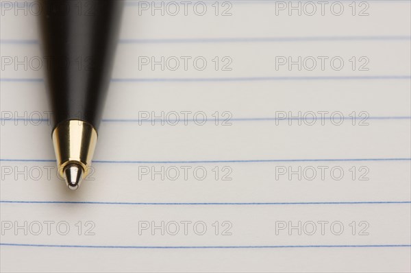 Pen and pad of lined paper