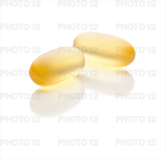 Omega 3 fish oil supplement capsules isolated on a white background