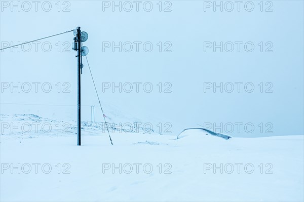 Snowed-in car in winter