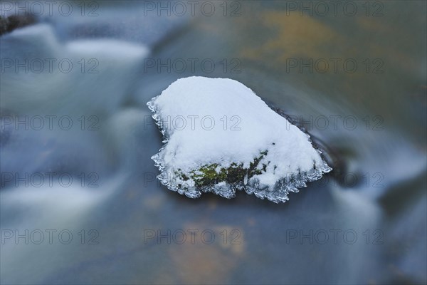 Icicles on wild river in nature reserve Hoelle