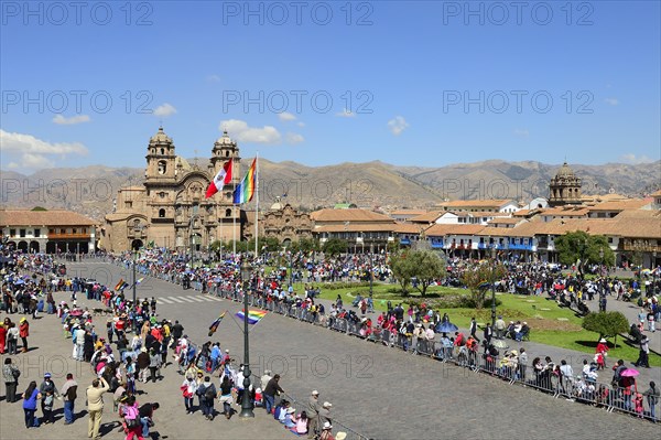 Plaza de Armas with Cathedral Catedral Basilica de la Virgen de la Asuncion in front of a parade